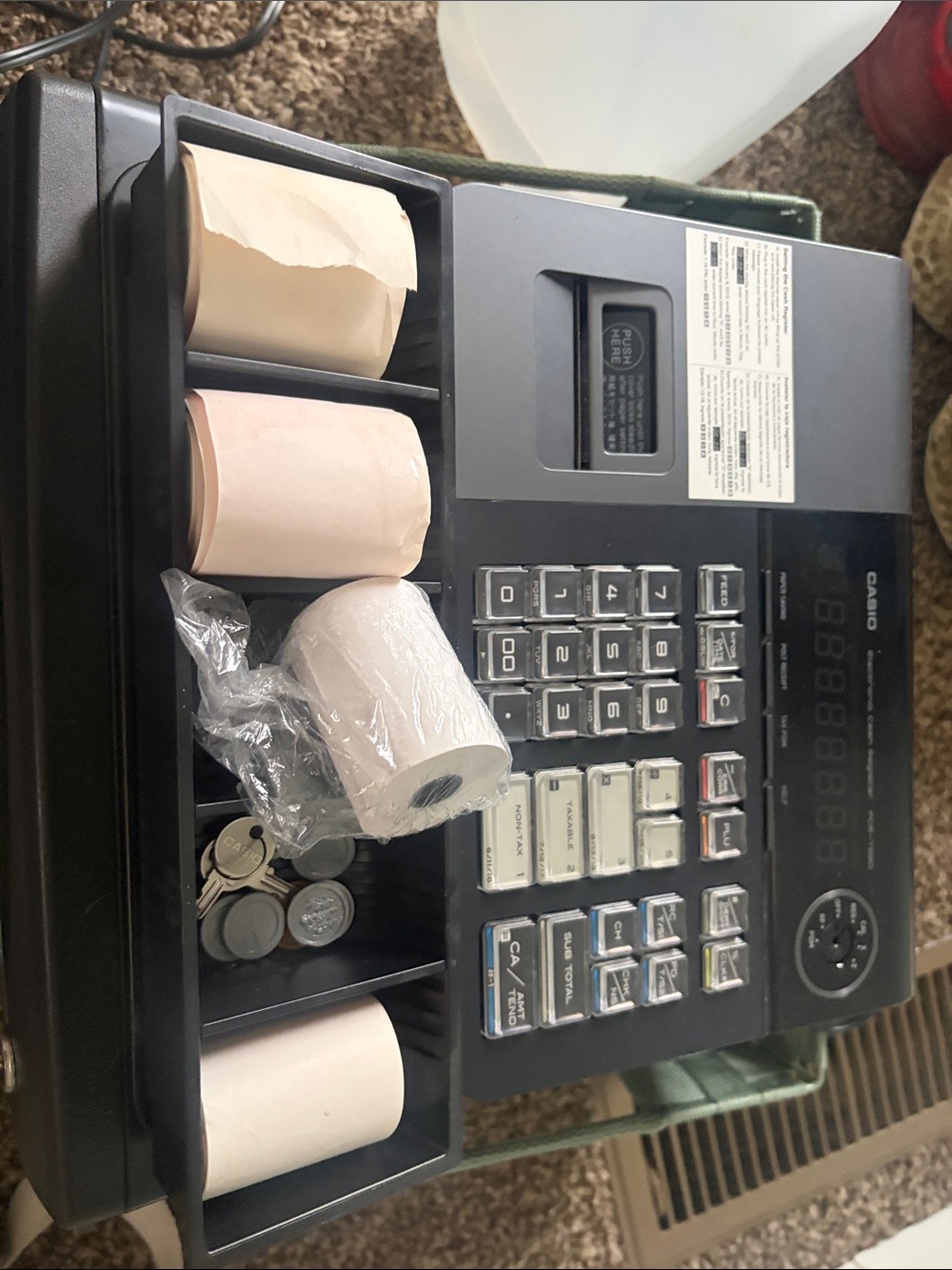 Casio Black Electronic Cash Register with White Receipt Rolls